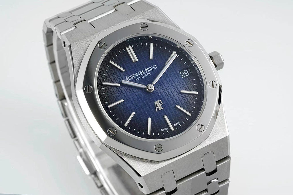 Audemars Piguet stainless steel watch with blue dial and baton hands, date marker at 29