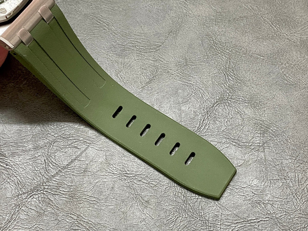 Green silicone watch strap with pin-and-buckle and adjustment holes