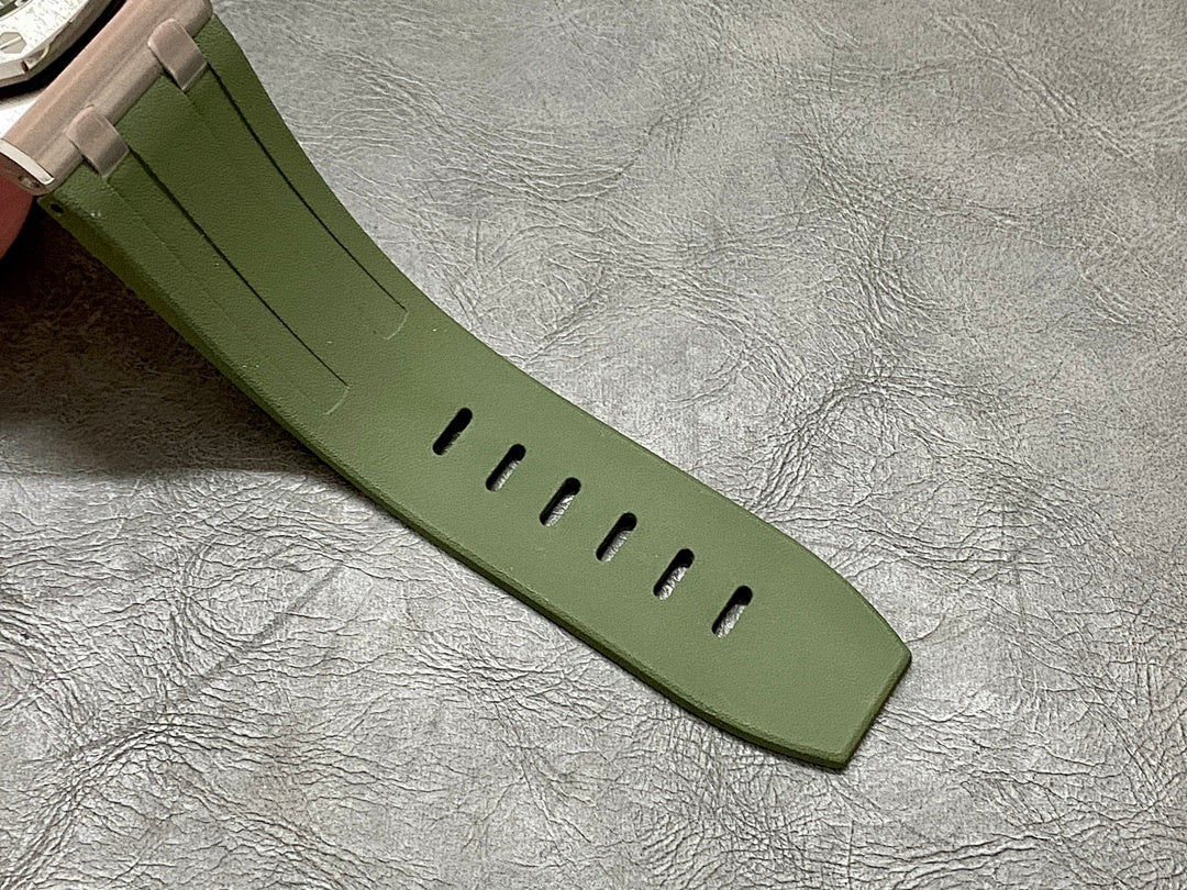 Green silicone watch strap with pin-and-buckle and adjustment holes