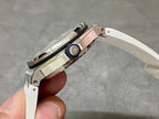 Audemars Piguet watch side with crown and strap, silver-tone case and rose accents