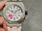 Audemars Piguet watch, front view of white dial with blue accents, on white rubber strap