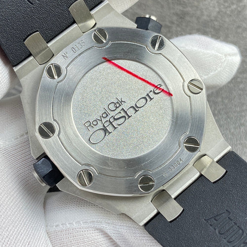 Audemars Piguet watch case back engraved, silver tone with red line accents