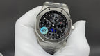Stainless steel Audemars Piguet watch with black dial, subdials, and blue accent