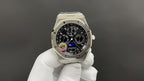 Octagonal stainless steel Audemars Piguet watch with black dial and multiple subdials