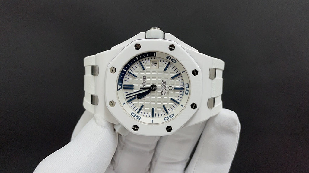 White sports watch with blue dial and chronograph-style subdials