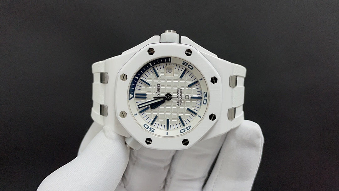 White sports watch with blue dial and chronograph-style subdials