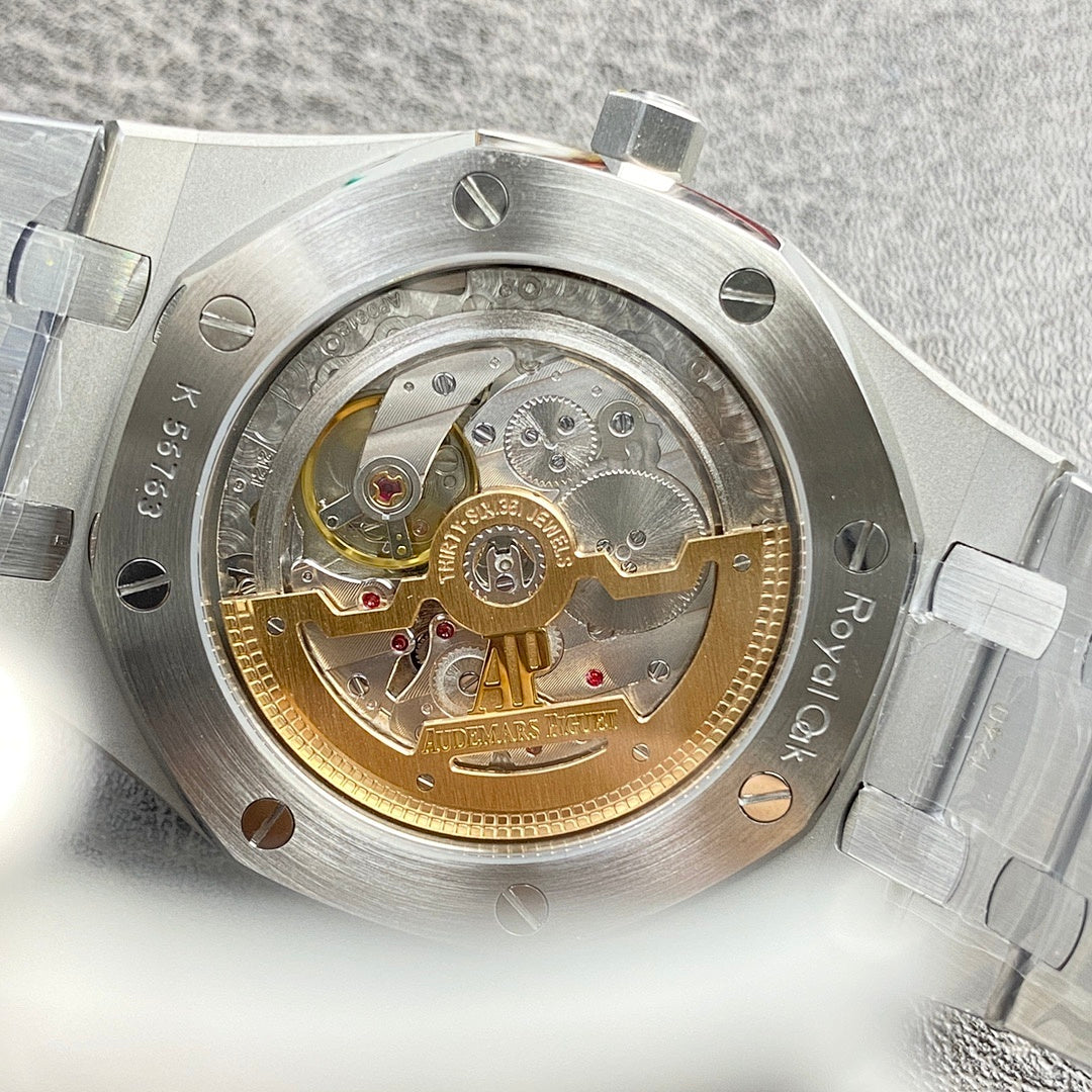 Audemars Piguet watch caseback with exposed gold movement and silver screws