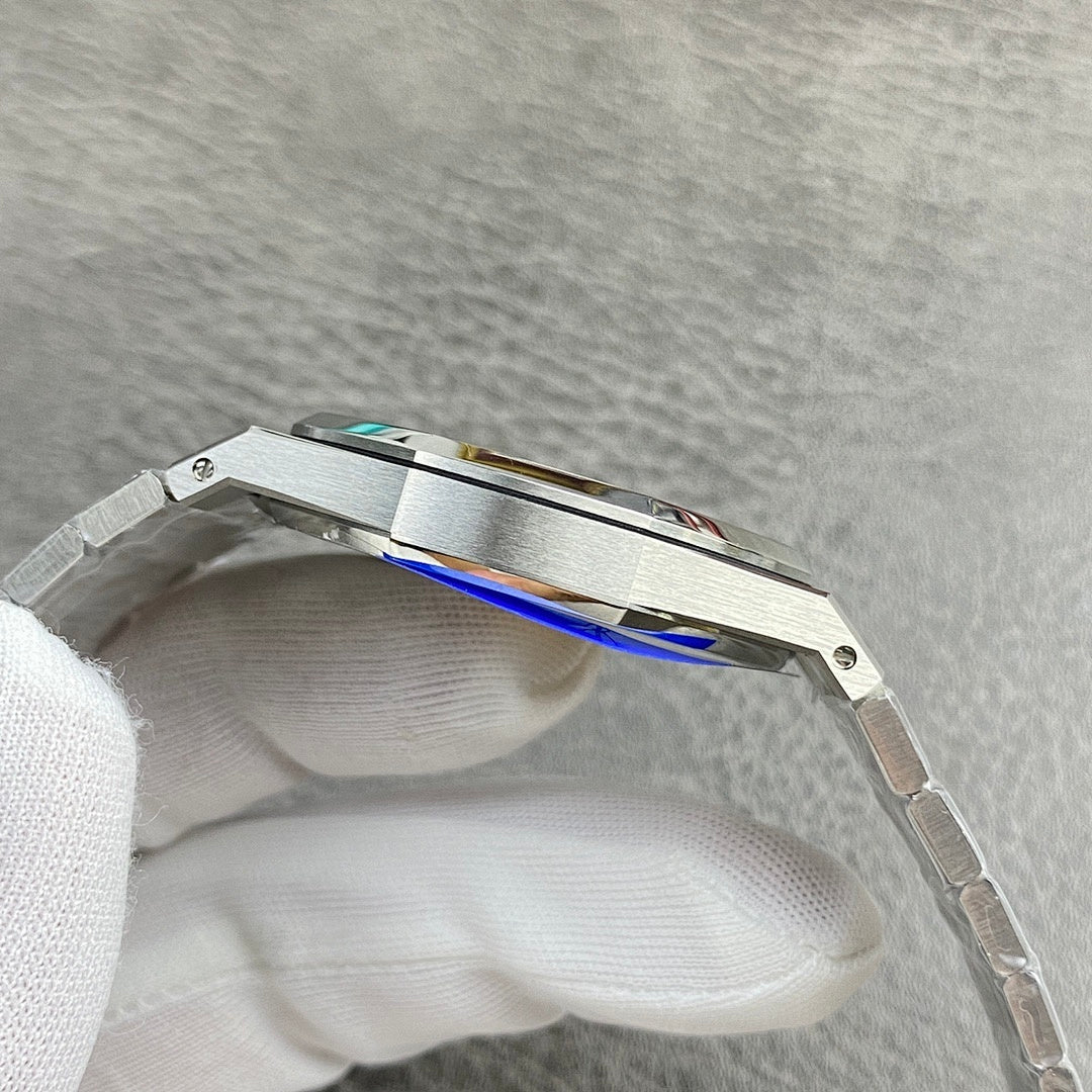 Audemars Piguet watch side view with silver case and blue-toned trim near bezel