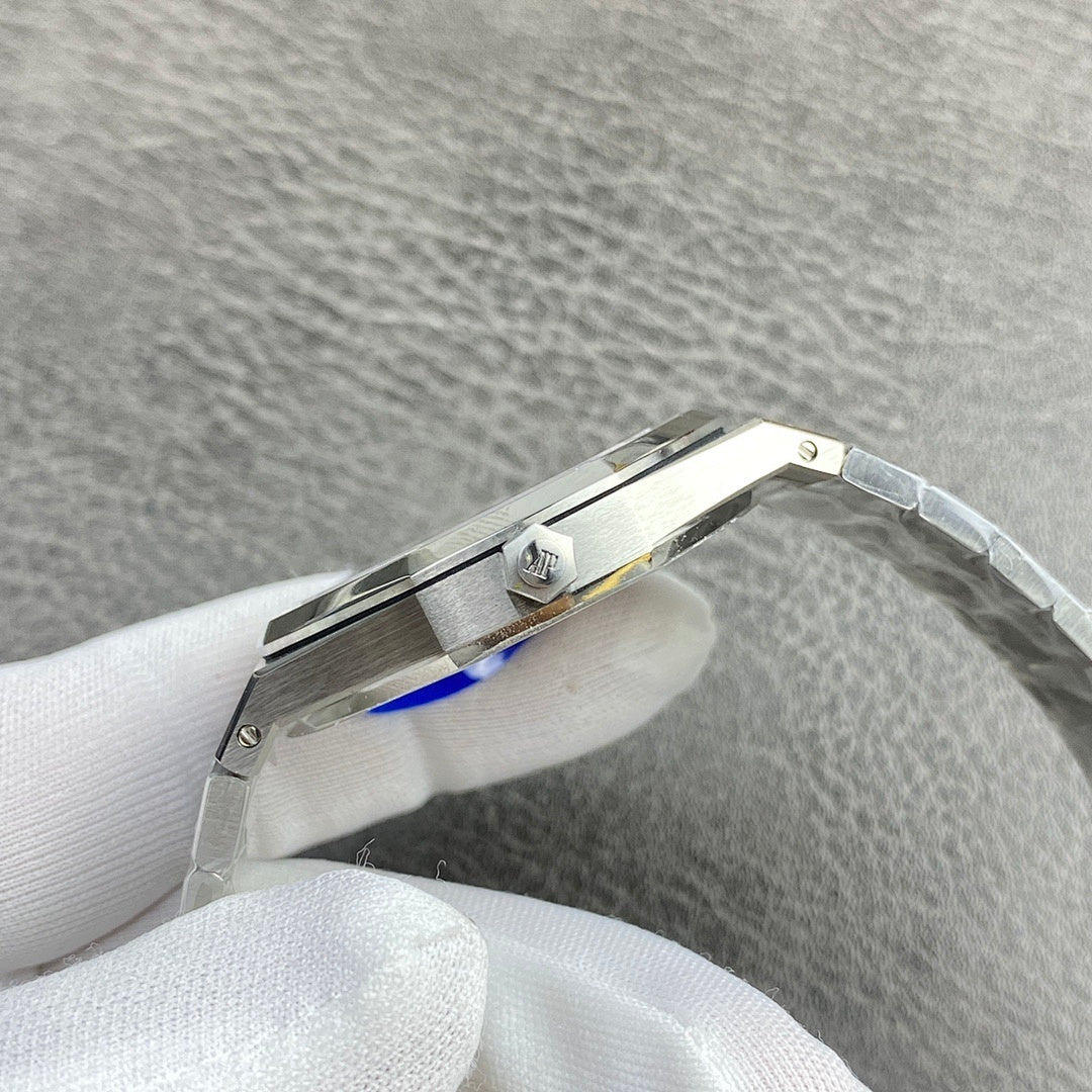 Audemars Piguet watch side close-up with crown and silver band links