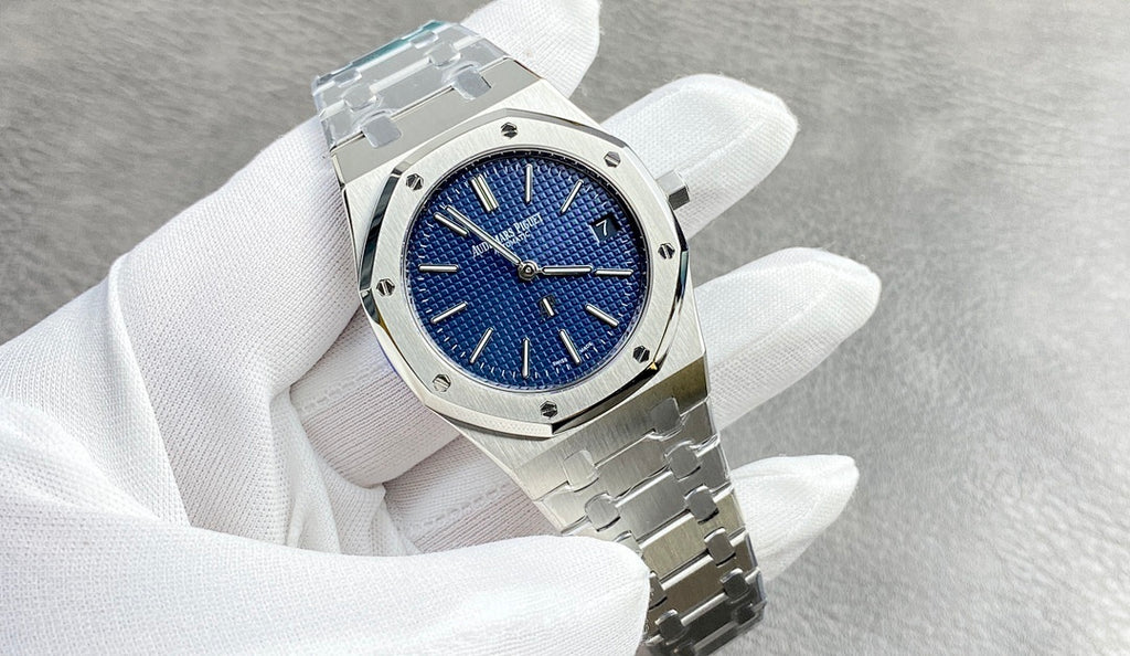 Audemars Piguet watch with blue dial and silver link bracelet, three-quarter view
