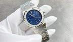 Audemars Piguet watch with blue dial and silver link bracelet, three-quarter view