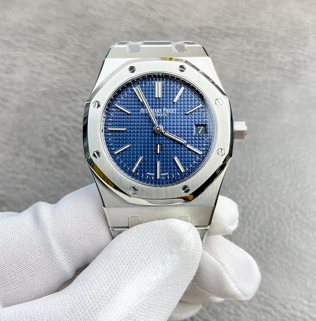 Audemars Piguet watch with blue dial, silver bracelet clasp visible, front close-up