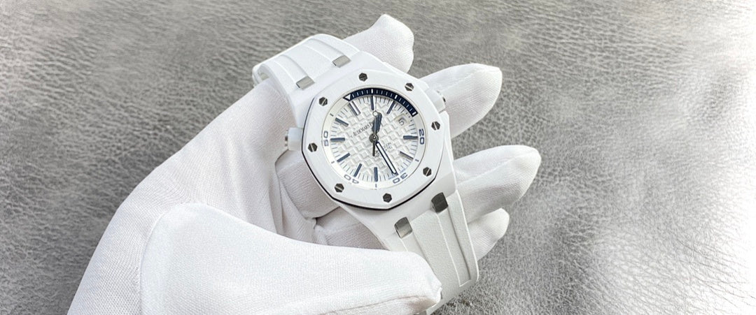 White rubber sports watch angled view with blue-accent dial and crown.