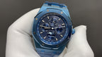 Audemars Piguet watch with blue dial, chronograph subdials, and blue bracelet
