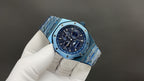 Audemars Piguet watch angled view showing blue dial and blue link bracelet