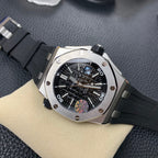 Audemars Piguet Royal Oak watch with black dial, steel case, black rubber strap, angled