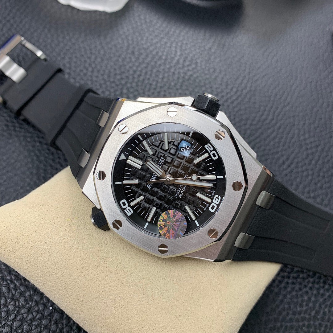 Audemars Piguet Royal Oak watch with black dial, steel case, black rubber strap, angled