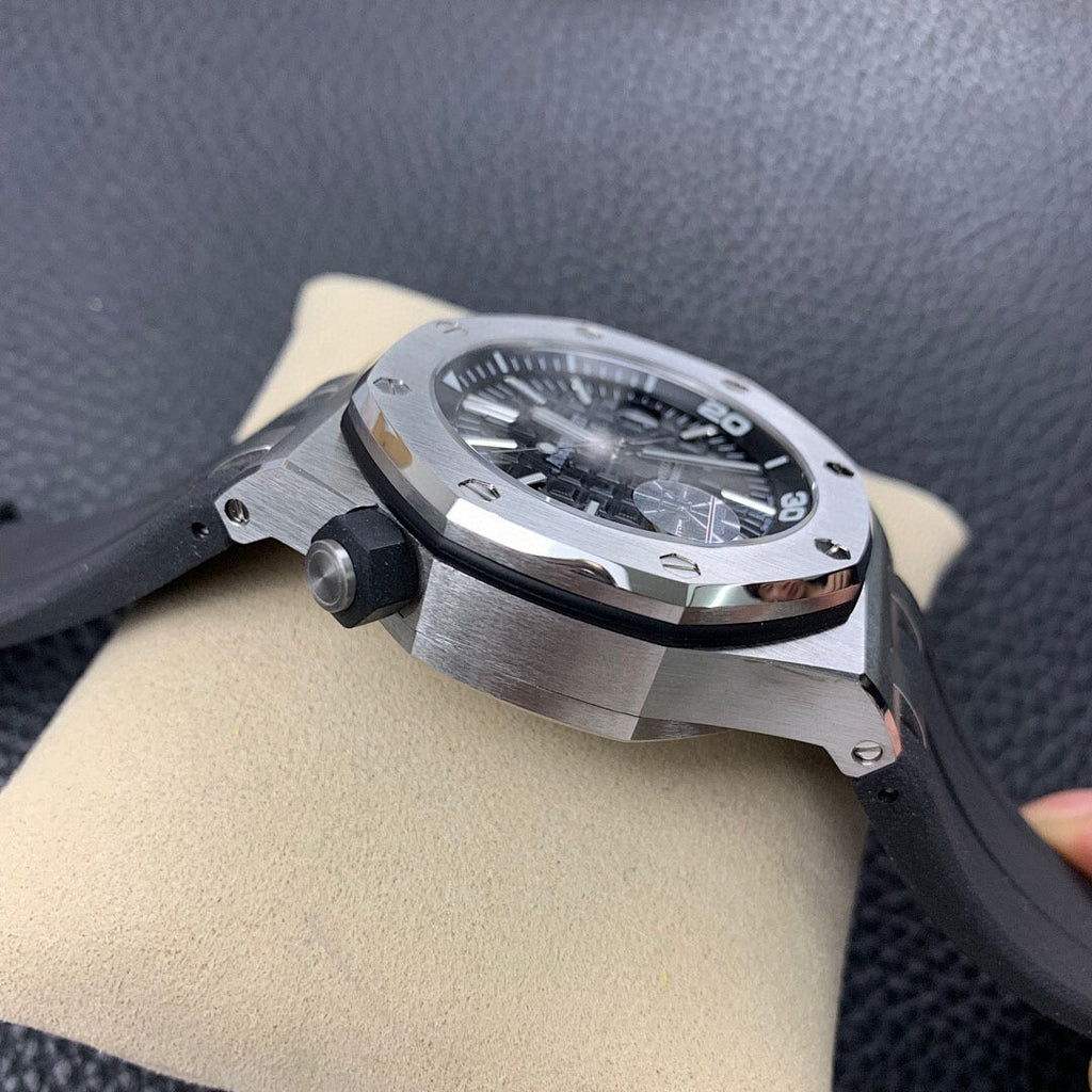 Audemars Piguet Royal Oak watch in side profile with steel case and black rubber strap