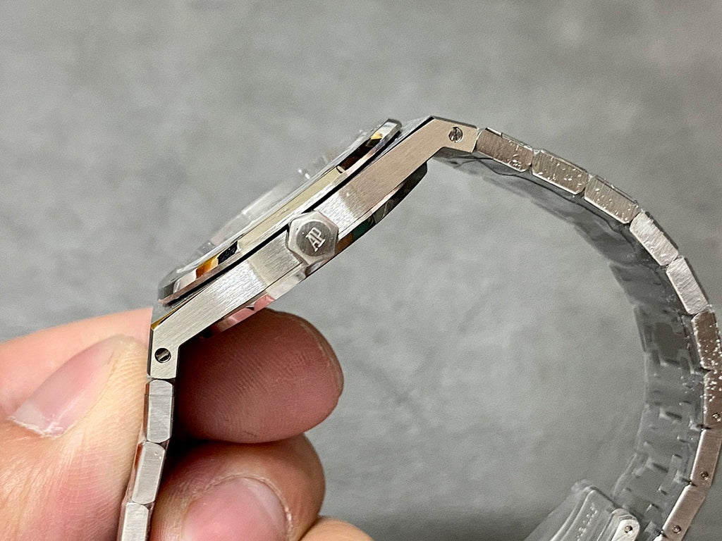 Audemars Piguet Royal Oak watch side view with polished bezel and crown