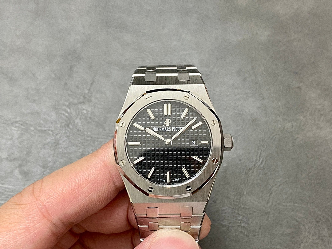 Audemars Piguet watch front view with black textured dial, steel bezel and linked bracelet