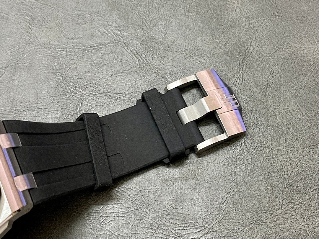 Black rubber watch strap with stainless steel buckle clasp