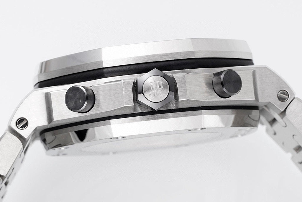 Stainless steel watch side profile with crown and pushers, brushed finish