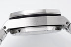 Audemars Piguet watch case closeup with brushed metal bezel and black bezel ring