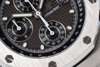 Audemars Piguet watch dial closeup with black tachymeter scale and chronograph hands