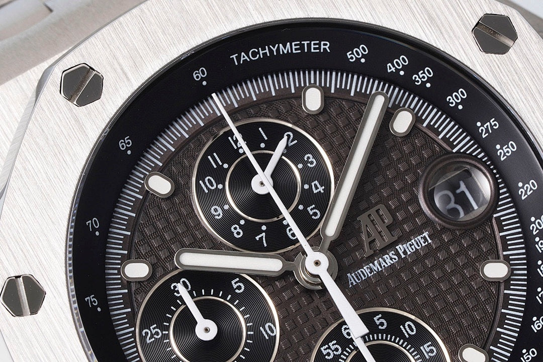 Audemars Piguet watch dial closeup with black subdials and white tachymeter markers