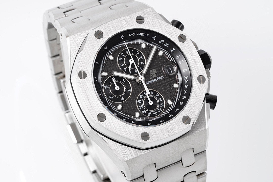 Audemars Piguet watch front view with black dial, tachymeter scale and steel case