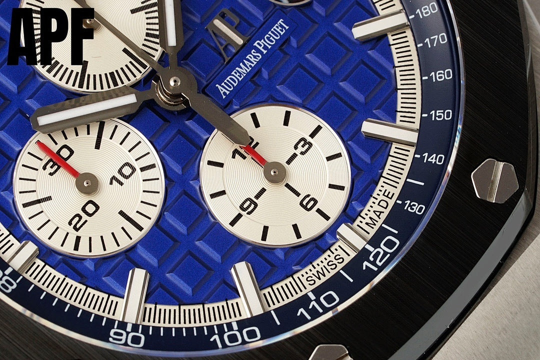 Close-up of blue dial chronograph with tachymeter bezel and white subdials
