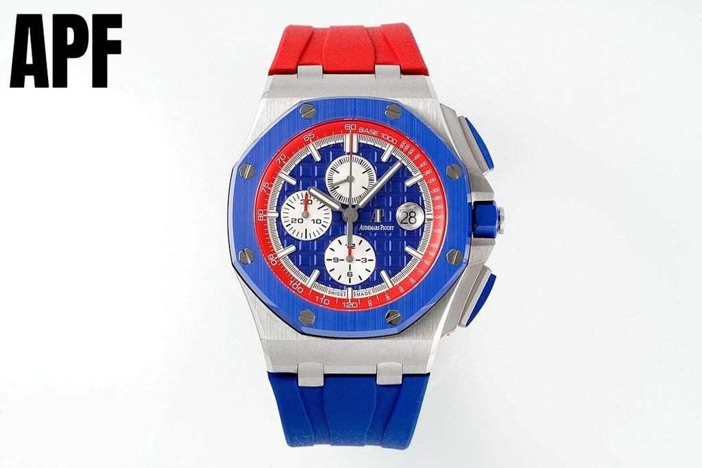 Sports watch with blue dial, red bezel, steel case, red-and-blue silicone strap