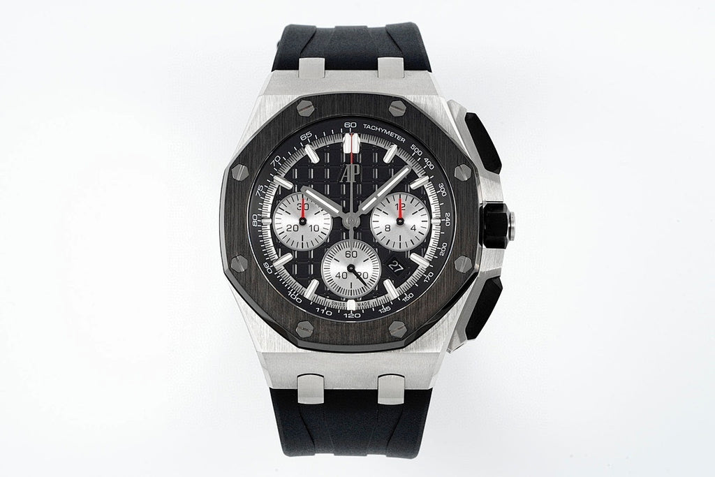 Audemars Piguet chronograph watch with black dial, three subdials, and black rubber strap