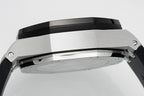 Audemars Piguet watch side view with brushed metal case and black bezel