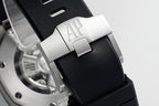 Audemars Piguet watch strap buckle in brushed metal on black rubber band