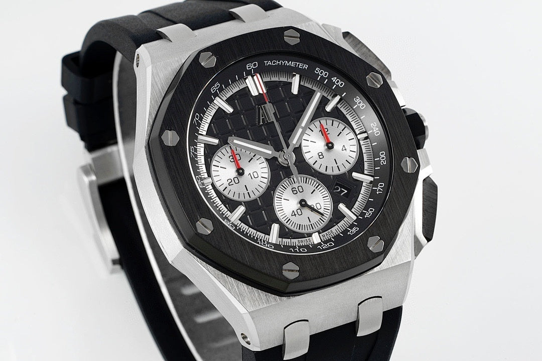 Audemars Piguet chronograph watch three-quarter view with black dial and metal bezel