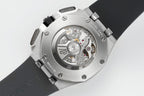 Audemars Piguet Royal Oak caseback, open sapphire window showing mechanical movement, steel case