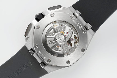 Audemars Piguet Royal Oak caseback, open sapphire window showing mechanical movement, steel case