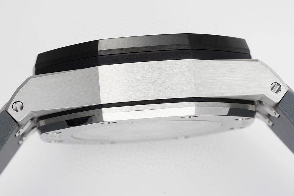 Audemars Piguet Royal Oak watch side view, brushed steel case with black bezel ring