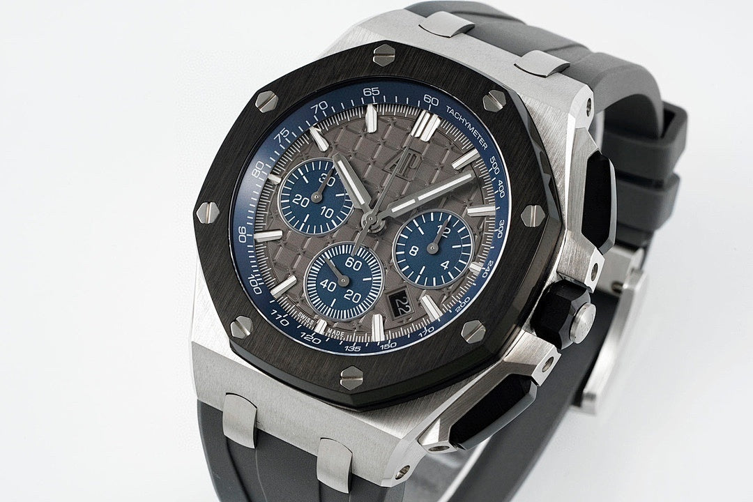 Audemars Piguet Royal Oak chronograph watch, blue dial, octagonal steel case, black rubber strap
