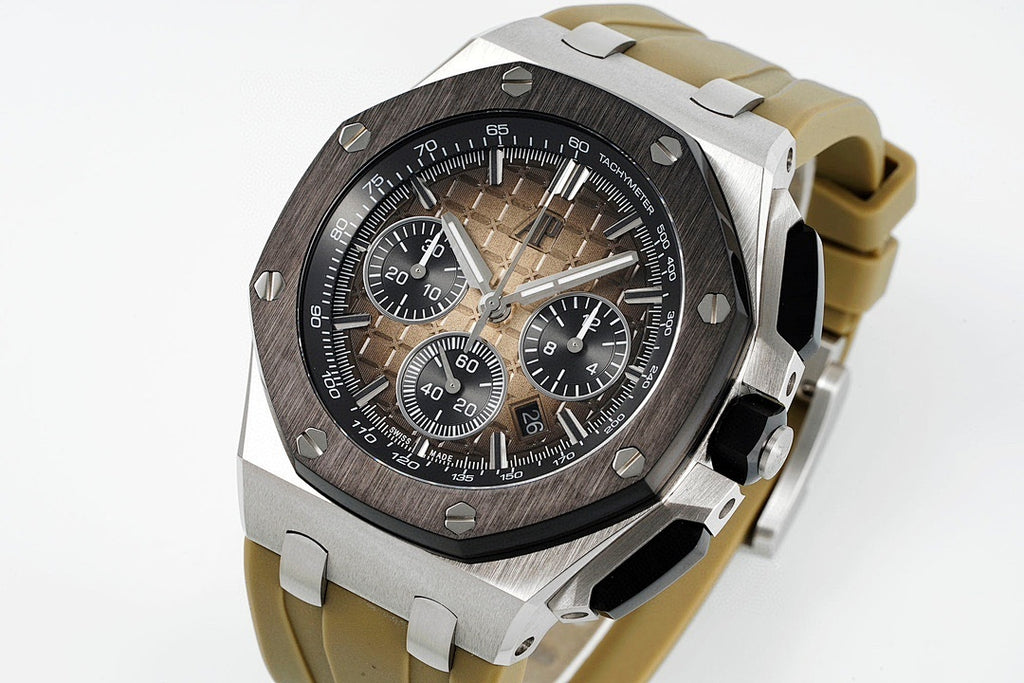 Sports watch with black dial, silver case, tan rubber strap side angle