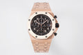 Rose-gold tone Royal Oak chronograph watch with black dial and metal link bracelet