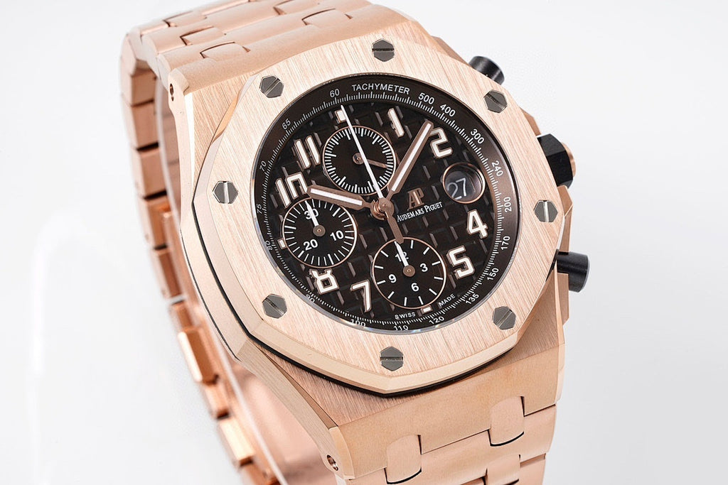 Rose-gold tone watch case and bracelet with black dial and multiple subdials