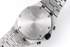 Audemars Piguet watch caseback with engraved text on brushed silver
