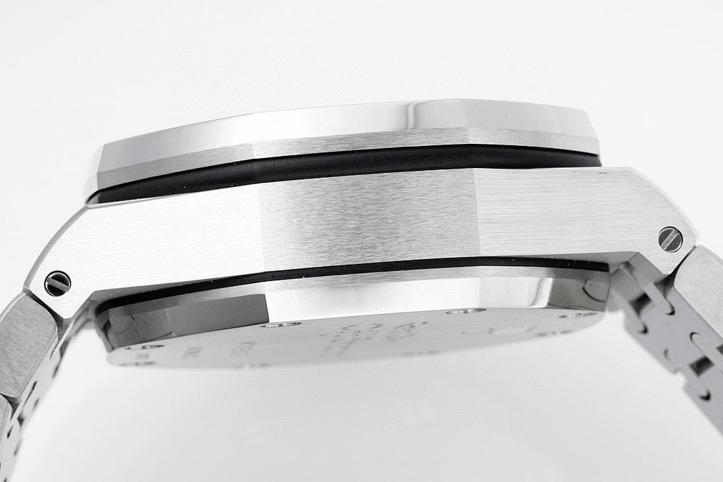 Silver-tone watch case and bezel with brushed metal finish, close-up