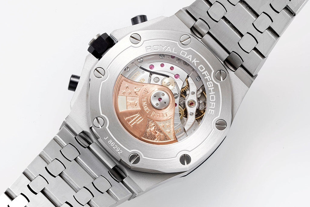 Sapphire caseback watch showing mechanical movement through clear window