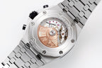 Sapphire caseback watch showing mechanical movement through clear window