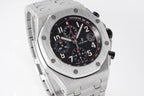 Stainless steel chronograph watch with black dial, tachymeter bezel, and three subdials