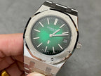 Audemars Piguet watch with green dial, metal bracelet, and date window at 24
