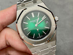 Audemars Piguet watch close-up with green dial, hour markers, and date at 24